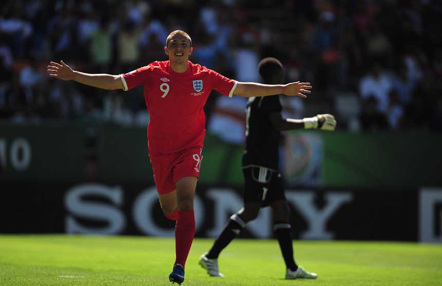 Hallam Hope celebrates his goal against Rwanda.